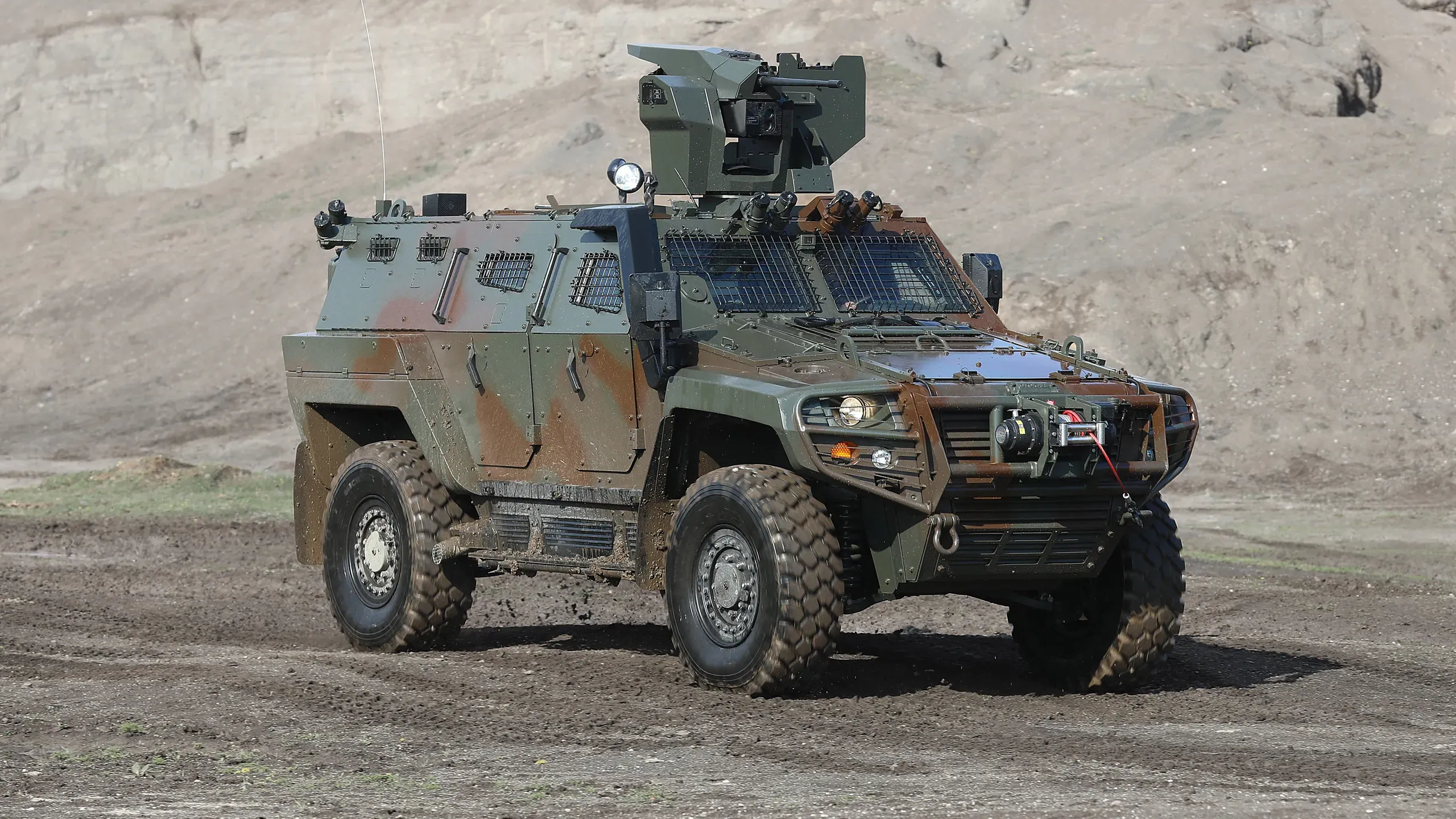 AIBAR 4×4 with remote weapon station on a dirt range