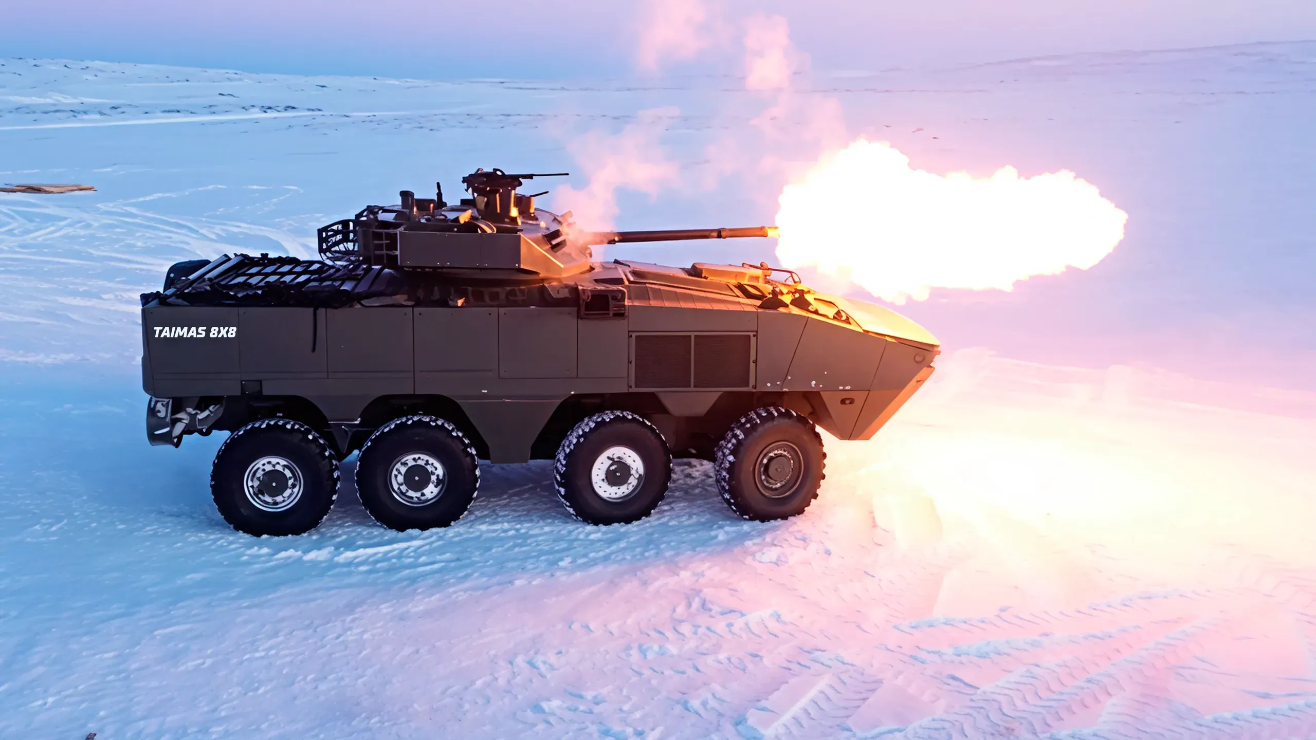 TAIMAS 8×8 firing its 100 mm turret on a snowfield