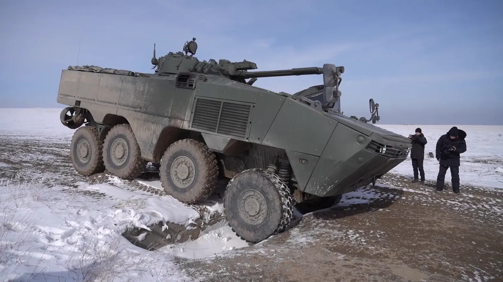 TAIMAS 8×8 climbing a frozen slope during trials